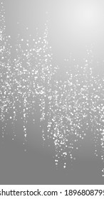 Random white dots Christmas background. Subtle flying snow flakes and stars on grey background. Alive winter silver snowflake overlay template. Stylish vertical illustration.