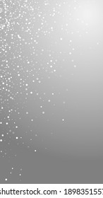 Random White Dots Christmas Background. Subtle Flying Snow Flakes And Stars On Grey Background. Adorable Winter Silver Snowflake Overlay Template. Juicy Vertical Illustration.