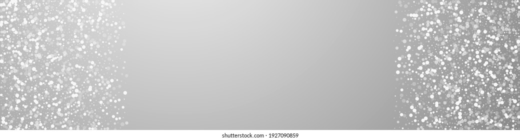 Random white dots Christmas background. Subtle flying snow flakes and stars on grey background. Bizarre winter silver snowflake overlay template. Rare panoramic illustration.