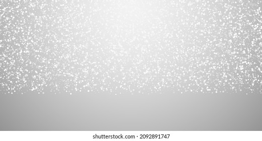 Random white dots Christmas background. Subtle flying snow flakes and stars on light grey background. Beauteous winter silver snowflake overlay template. Cute vector illustration.