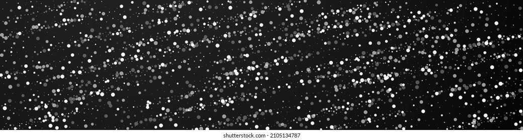 Random white dots Christmas background. Subtle flying snow flakes and stars on black background. Bold winter silver snowflake overlay template. Fresh panoramic illustration.