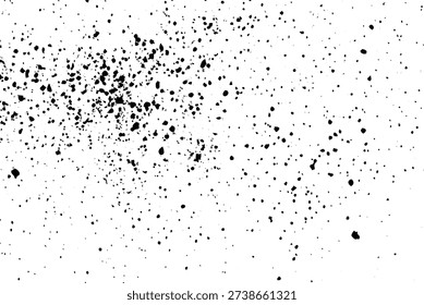 Randomly distributed black ink splatters and small dots on a crisp white surface, forming a grunge overlay texture.