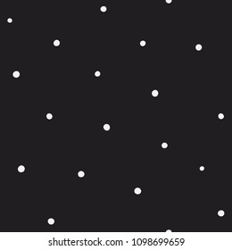 Randomly placed polka dots, hand drawn spots seamless vector pattern. Scattered big and small circles, points in various sizes. Monochrome retro background. Decorative black and white design tiles.