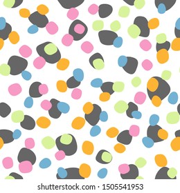 Randomly scattered colored round spots. Abstract seamless pattern. Simple vector illustration.
