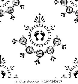 Rangoli design concept of flower petals circles, foot prints and leaves is in Seamless pattern