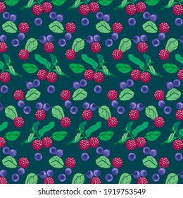 Raspberries and blueberries with mint leaves