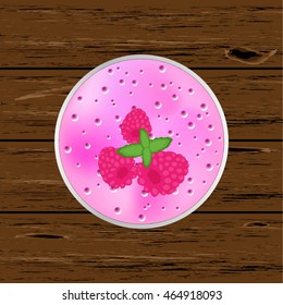 Raspberry smoothie on wood background. Top view. Vector illustration