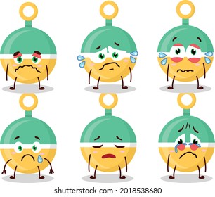 Rattle cartoon in character with sad expression. Vector illustration