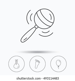 Rattle toy, footprint and air balloon icons.