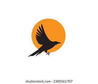 Raven bird silhouette on sunset, vector. Flying bird illustration on sunset isolated on white background. Wall decals, wall artwork. Concept of love and freedom