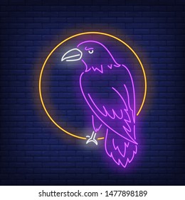 Raven in circle neon sign. Bird, mystery, Halloween design. Night bright neon sign, colorful billboard, light banner. Vector illustration in neon style.
