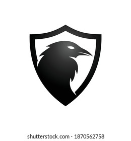 Raven logo on shield. abstract illustration of a crow on a shield