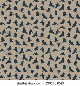 Raven Seamless Pattern - Silhouettes of flying ravens repeating pattern design