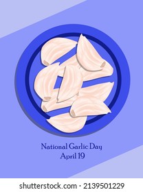 Raw garlic on a blue plate, National Garlic Day April 19