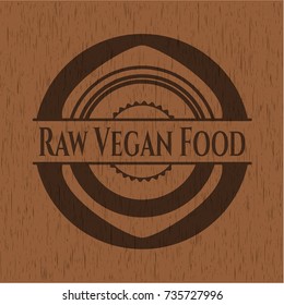 Raw Vegan Food badge with wooden background