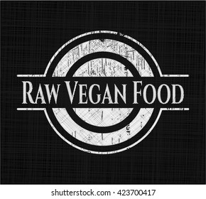 Raw Vegan Food chalkboard emblem written on a blackboard