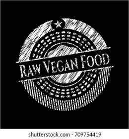 Raw Vegan Food chalkboard emblem written on a blackboard