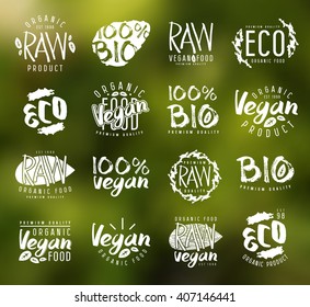 Raw vegan labels, badges and design elements with hand-drawn lettering. White print on blurred background