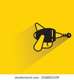ray gun icon with shadow on yellow background