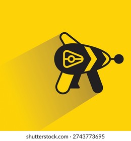 ray gun icon with shadow on yellow background