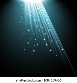 Rays of light with sparkles on black background, light effect, aqua color