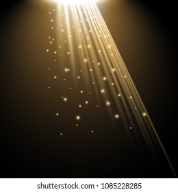 Rays of light with sparkles on black background, light effect, golden color