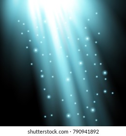 Rays of light with sparkles on black background, light effect, aqua color