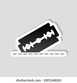 razor blade and cutting line. simple single icon. Sticker style with white border and simple shadow on gray background