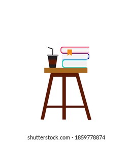  reading books with a drink on the chair.