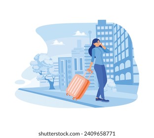 Ready for a business trip. A businesswoman walking along a city street is holding a suitcase and making a call with her cell phone. Happy, calm, peaceful girl volunteer concept. 