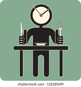 Ready for dinner: Man is sitting in front of a plate and waiting for food to be served.