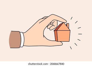 Real estate and apartment concept. Human hand holding little tine house apartment for sale or rent vector illustration 