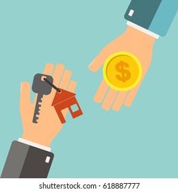 Real estate concept. Agent holding a key for home, and buyer is hold money. Buying house