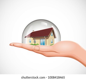 Real estate concept - house on hand