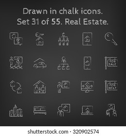 Real estate icon set hand drawn in chalk on a blackboard vector white icons on a black background.