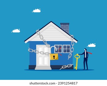 Real estate investment concepts. Businessman uses key to unlock house 