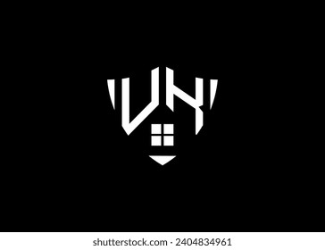 Real estate letter UK shield shape logo and house building vector template