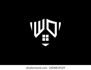 Real estate letter WO shield shape logo and house building vector template