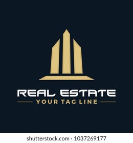 Real estate logo, creative gold towers. 