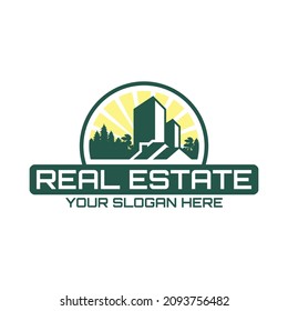 Real estate logo design template.  Building construction with trees logo design template. Real estate icon