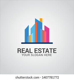 Real estate logo design vector with flat color concept. Clean and modern design of real estate and city building logo template.