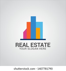 Real estate logo design vector with flat color concept. Clean and modern design of real estate and city building logo template.