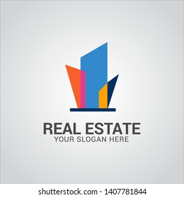 Real estate logo design vector with flat color concept. Clean and modern design of real estate and city building logo template.
