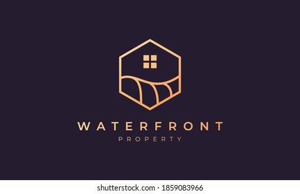 real estate logo with a hexagon base shape with ocean wave and window