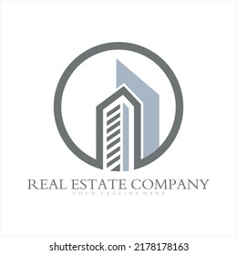 Real Estate Logo Vector With Tall Building Icon