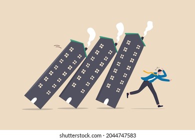 Real estate or property debt crisis causing domino effect, housing and stock market or investment asset fall down concept, panic businessman investor run away from collapsing housing domino.