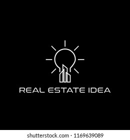 Real estate skyscraper and lamp idea logo design template