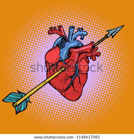real heart with Cupid arrow. Comic cartoon pop art retro vector drawing