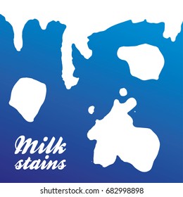 Real milk stains - set of silhouettes. Isolated on blue background. Vector. Eps 10