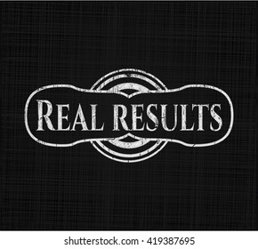 Real results chalk emblem written on a blackboard